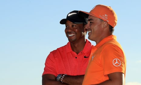 Rickie Fowler with Tiger Woods after winning the Hero World Challenge