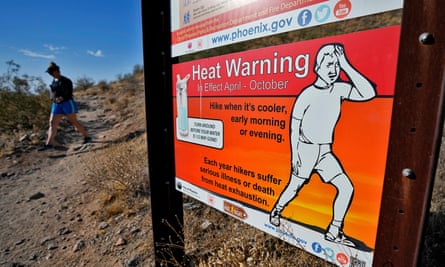 A sign by a hiking trail Monday in Phoenix.