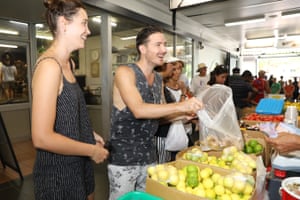Locals buy fruit and veg at Rapid Creek market