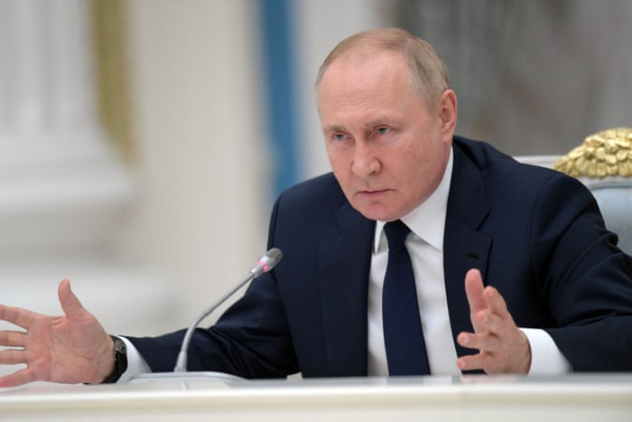 Russian President, Vladimir Putin, attends a meeting with parliamentary leaders in Moscow.