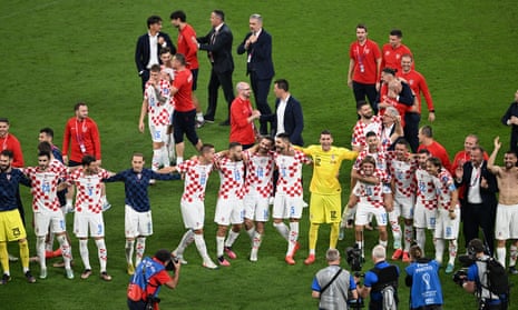 Players and coaching staff of Croatia celebrate their victory at the end of the FIFA World Cup Qatar 2022 3rd Place Match between Croatia and Morocco.