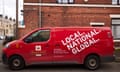 A van carrying Royal Mail postal deliveries in Bury, Greater Manchester, with ‘local, national, global’ written on the side.