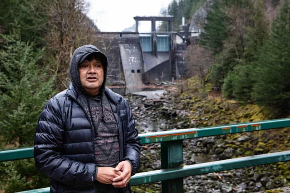 Scott Schuyler stands in front of the Gorge Dam, which diverts the entire Skagit River into a hydroelectric tunnel.