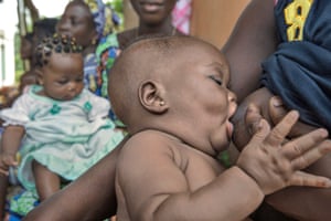 Mother breastfeeding baby in Benin