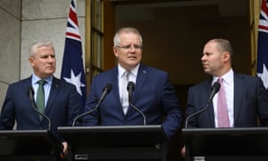 Scott Morrison at a press conference alongside Michael McCormack, left, and Josh Frydenberg, right