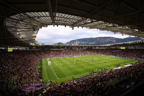 The players warm up at Stade de Geneve.