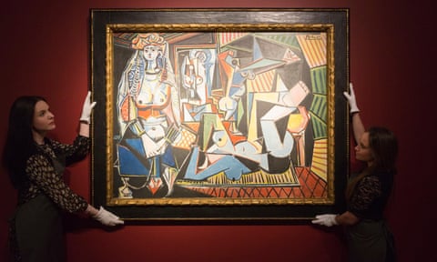 Christie’s employees with Pablo Picasso’s Women of Algiers