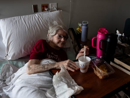 a women laying in a hospital bed