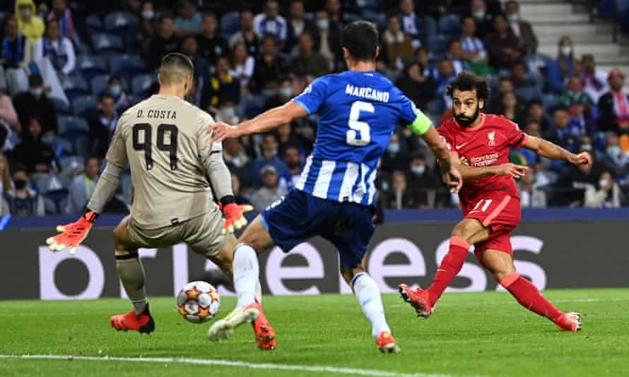 Mohamed Salah and Roberto Firmino double up as Liverpool crush Porto | Champions League 1 Mohamed Salah shoots and Diego Costa attempts to save in the match when Salah scored twice.