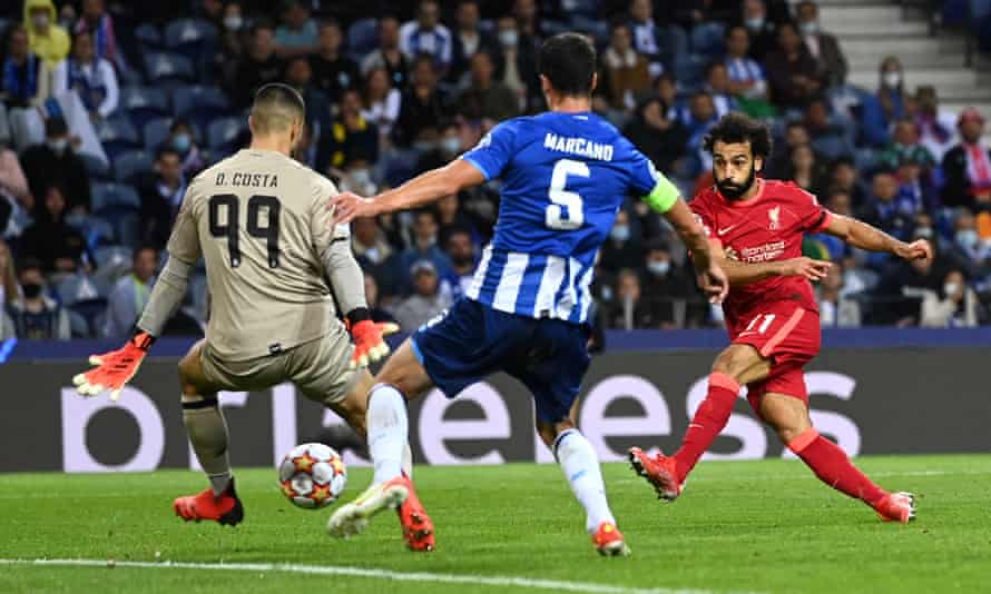 Mohamed Salah shoots and Diego Costa attempts to save in the match when Salah scored twice.