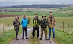 The Restore team standing on a lane surrounded by fields