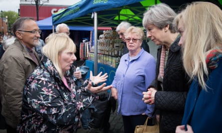 Theresa May meeting voters , during the 2017 general election campaign.