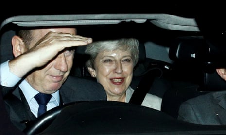 The former prime minister, Theresa May, leaves the Houses of the Parliament after Boris Johnson’s defeat