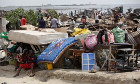 Residents salvage objects from houses demolished by government officials in Otodo-Gbame waterfront in Lagos. 