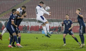 Serbia’s Luka Jovic (centre) scores their equalizer.