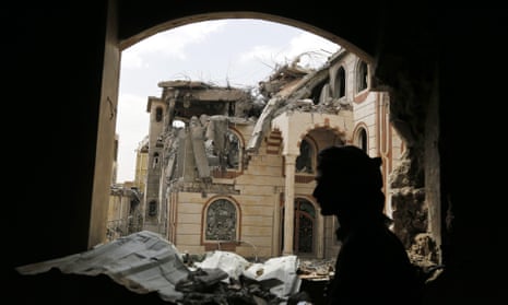 A Yemeni militiaman in the ruins of the house of a commander loyal to the Houthis after it was hit by two airstrikes allegedly carried out by the Saudi-led coalition in Sana’a. 