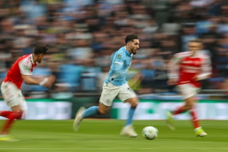 Rayan Cherki attacks against Arsenal in the Carabao Cup final.