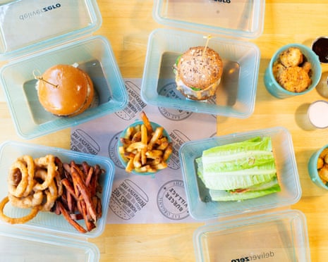 Burger Village food in DeliverZero's reusable containers