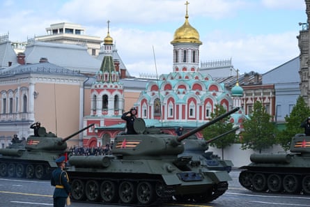 A column of Soviet era T-34 tanks drives across Red Square