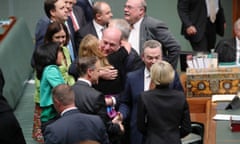 Trent Zimmerman gets a hug after the bill to amend the Marriage Act passes through the House of Representatives 