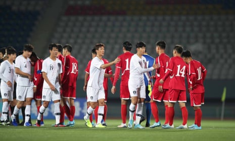 Players shake hands after the World Cup qualifier