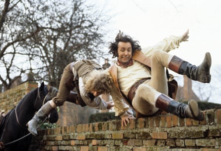 The pair leap over a brick wall