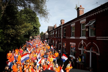 Netherlands fans bring noise and colour to Leigh before their match against Portugal.