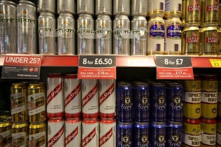 Cans of beer on display in an off-licence