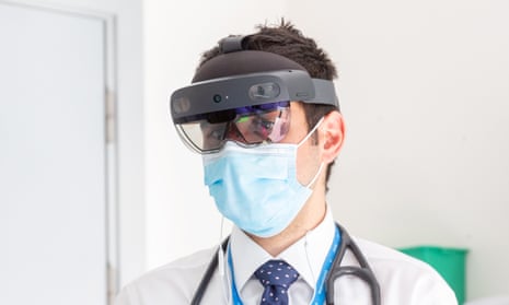 Dr Louis Koizia at St Mary’s hospital, one of Imperial College NHS trust’s sites, wearing a HoloLens headset