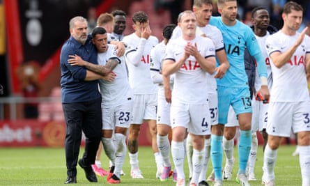 Ange Postecoglou embraces Pedro Porro as other players applaud the travelling fans after Tottenham won at Bournemouth
