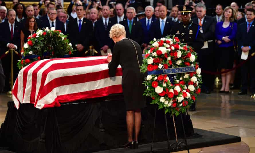 Cindy McCain, John McCain's widow, pays her respects at her husband's casket inside the US Capitol rotunda in Washington DC, 31 August 2018.