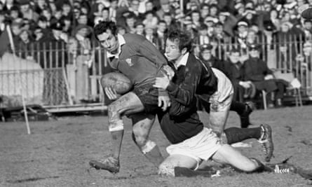 Scotland’s Ian Robertson, right, joins a team-mate to try and detain the Wales captain Gareth Edwards in an 18-9 win for the home side at Cardiff Arms Park in the 1970 Five Nations.
