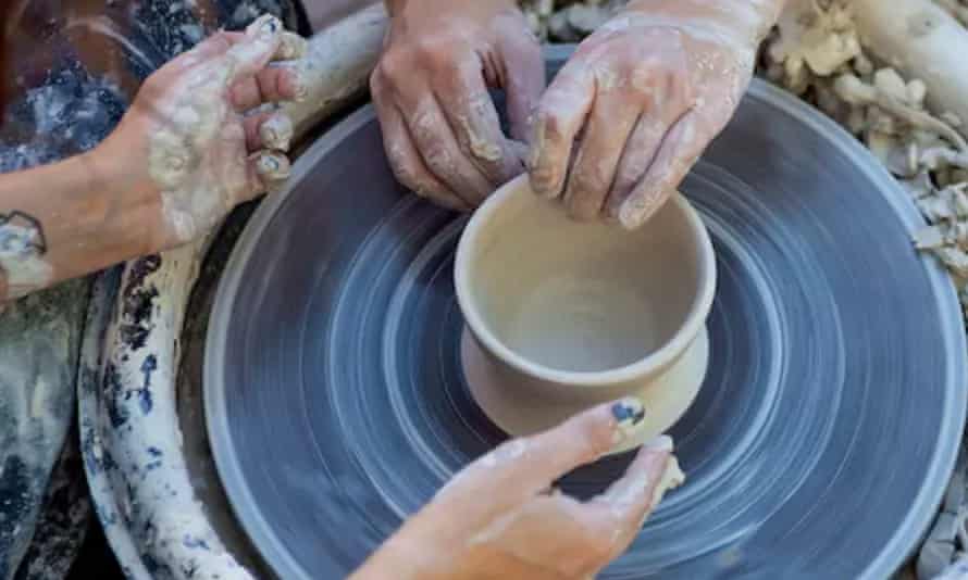 Making a pot on potter's wheel