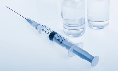 a syringe and needle and test tubes
