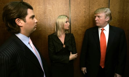 Donald Trump, right, talks with his children Donald Jr and Ivanka in an elevator while visiting his Chicago offices and his 92-story residential tower under construction in 2006.