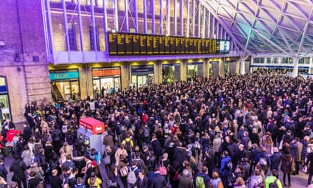 Hundreds of people waiting for trains amid delays at Kings Cross station.