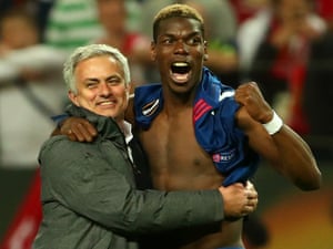 Manchester United manager Jose Mourinho and Paul Pogba celebrate winning the Europa League.
