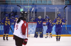 The Swedish players mob goaltender Sara Grahn for playing a decisive role in their unconvincing win.