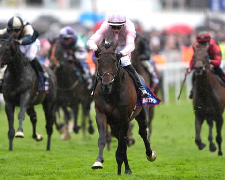Christmas Day, ridden by Ronan Whelan, on the way to winning the Betfred Derby at Epsom.