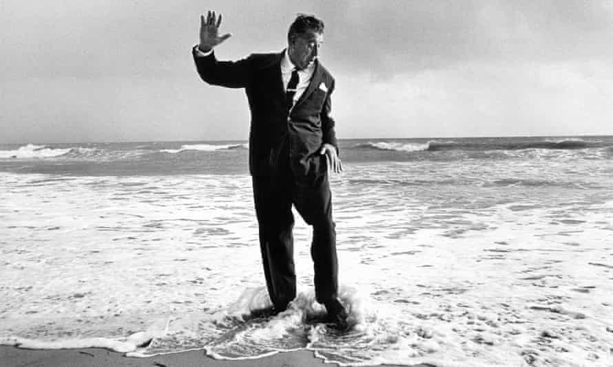 Sir Fred Pontin, 1967. Sally Soames had him stand with his back to the sea and when a surprise wave washed across his feet she caught him in a single exposure.