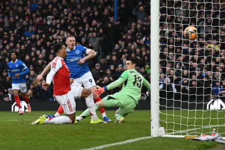 Colby Bishop (No 9) gives Portsmouth the early lead against Arsenal