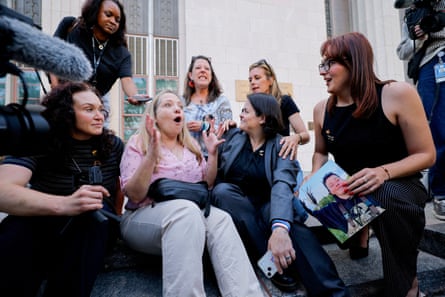 a group of women in front of cameras looking surprised and happy