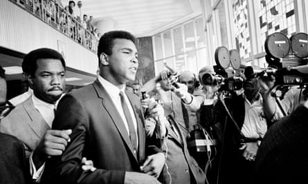 Muhammad Ali, leaving the federal building in Houston during a recess in his trial for refusing induction to the army in 1967.