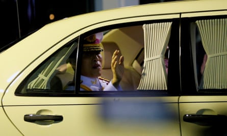 Thai king Maha Vajiralongkorn leaves after leading a graduation ceremony at Thammasat University in Bangkok in 2020