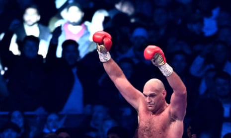 Tyson Fury celebrates after the referee stops the fight against Derek Chisora.