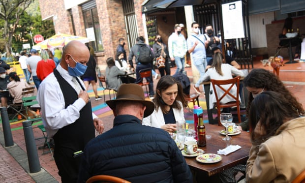 Diners enjoy a meal outside in Bogota. Colombia only lifted nationwide restrictions at the start of September.