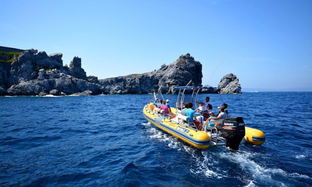 Small boat from Vertical Horizon on whale watching trip