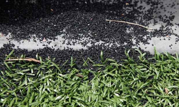 Ground-up tyre crumbs spill from the edge of a soccer field made from synthetic material and recycled tyres at the Crocker Amazon park in San Francisco, 2009.