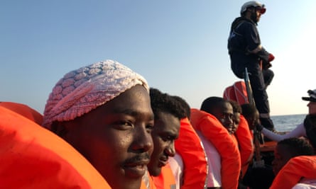 Migrants fleeing poverty and conflict in Africa are rescued after being stranded in the Mediterranean