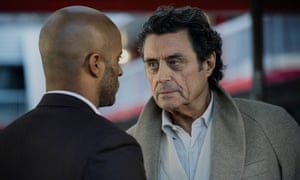 Ricky Whittle and Ian McShane in American Gods